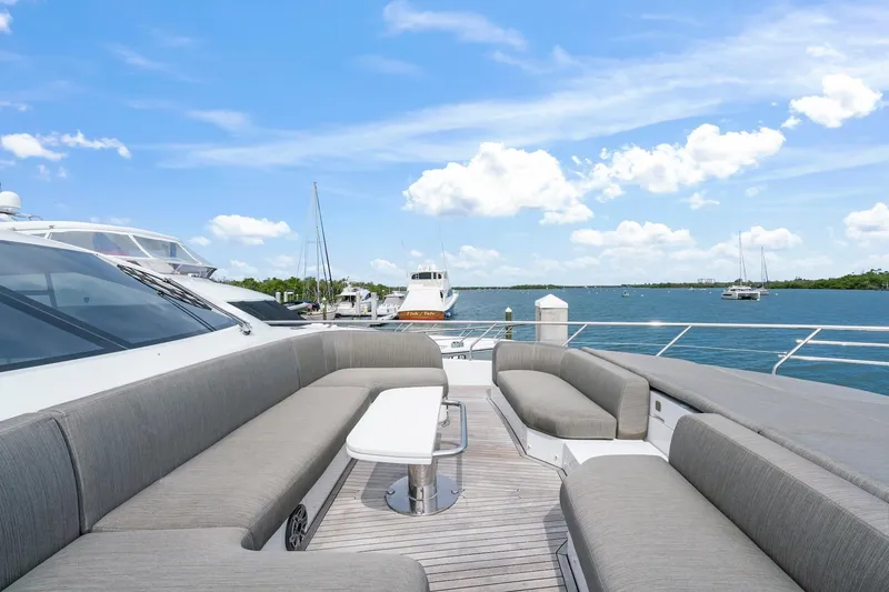 Slide: The Image of Luxurious 2020 Azimut Fly 78 yacht with spacious deck seating and ocean view. - 5