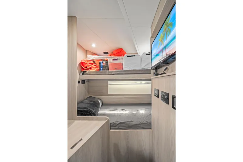 Slide: The Image of Interior of 2020 Azimut Fly 78 yacht cabin with bunk beds and wall-mounted TV. - 14