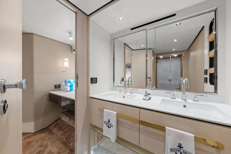 Slide: The Image of Luxurious bathroom interior of 2020 Azimut Fly 78 yacht with double sinks and elegant design. - 81