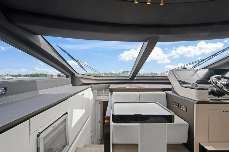 Slide: The Image of Luxurious interior of 2020 Azimut Fly 78 yacht with modern helm and seating area. - 56