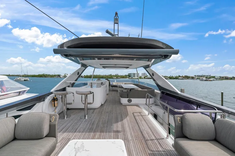 Slide: The Image of Luxurious 2020 Azimut Fly 78 yacht deck with modern seating and ocean view. - 35