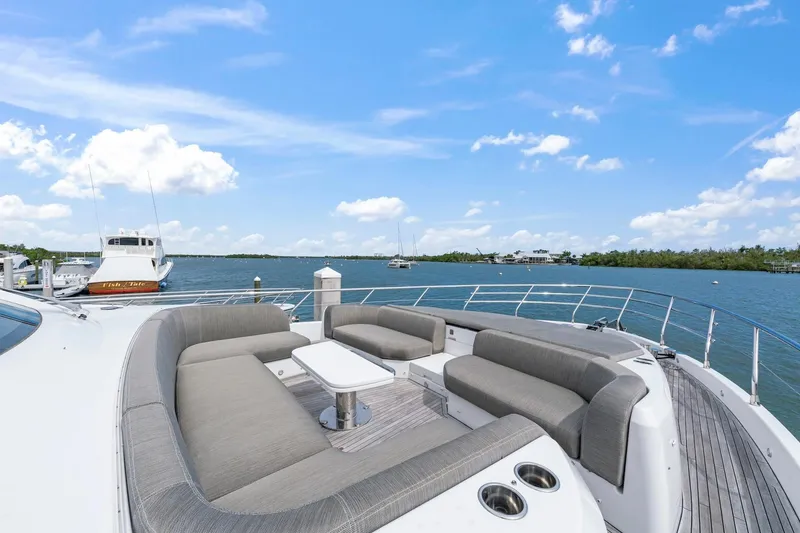 Slide: The Image of Luxurious seating area on 2020 Azimut Fly 78 yacht, overlooking serene waters. - 4
