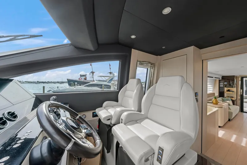 Slide: The Image of Interior of 2020 Azimut Fly 78 yacht with modern helm and luxurious seating. - 55