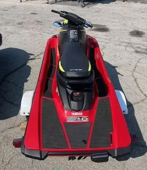 Slide: The Image of A red 2024 Yamaha Waverunner EX DELUXE is parked on a lot. - 4