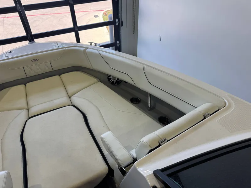 Slide: The Image of The image shows the interior of a 2020 Regal LS6 Surf with beige upholstery. - 18