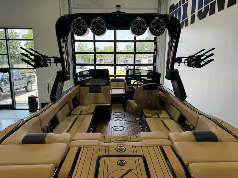 Slide: The Image of The interior of a 2025 MasterCraft X24 with luxurious seating and modern speakers. - 9