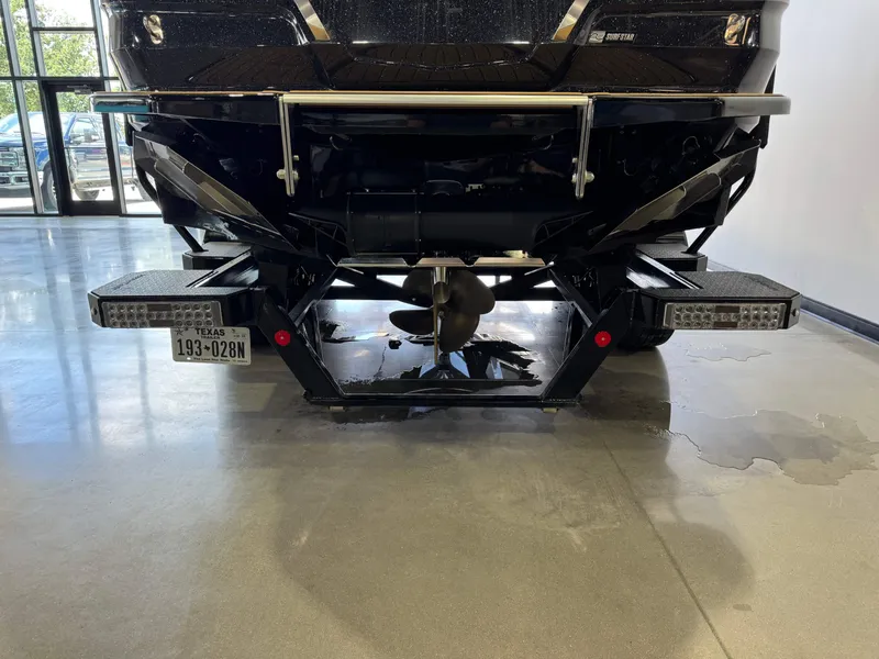 Slide: The Image of The image shows the rear of a 2025 MasterCraft X24 boat with a propeller. - 7