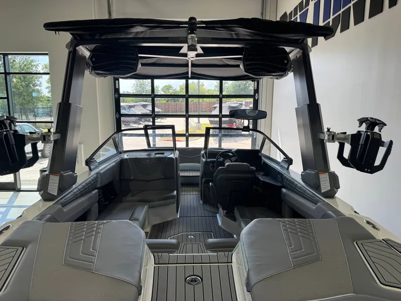Slide: The Image of The image shows the interior of a 2022 Nautique Super Air Nautique G21 with modern seating and controls. - 9