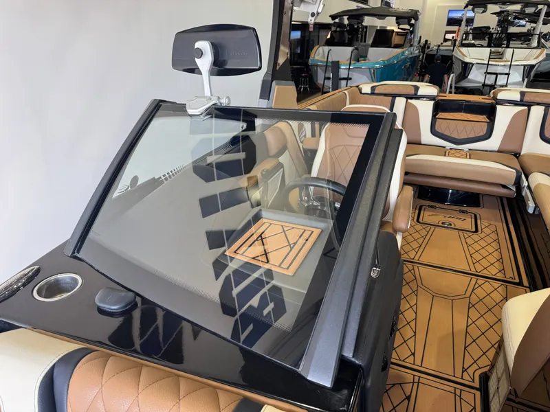Slide: The Image of The image shows the cockpit of a 2021 Tigé 25ZX with luxurious leather seating and modern design. - 19