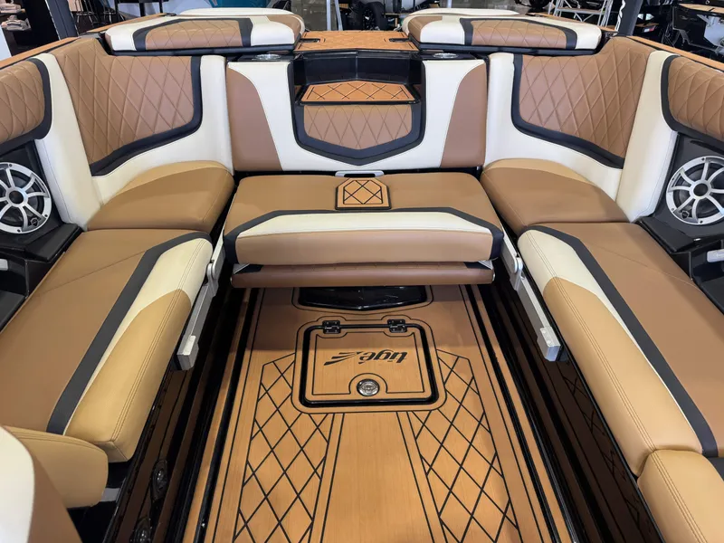 Slide: The Image of The image shows the luxurious interior of a 2021 Tigé 25ZX boat with elegant seating. - 25