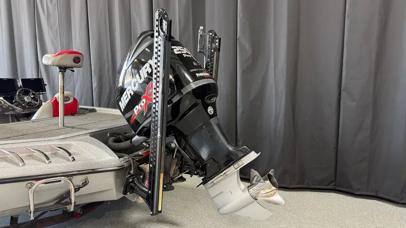 Slide: The Image of A 2015 Ranger Tugs Z520C with a Mercury Pro XS outboard motor, parked indoors. - 7