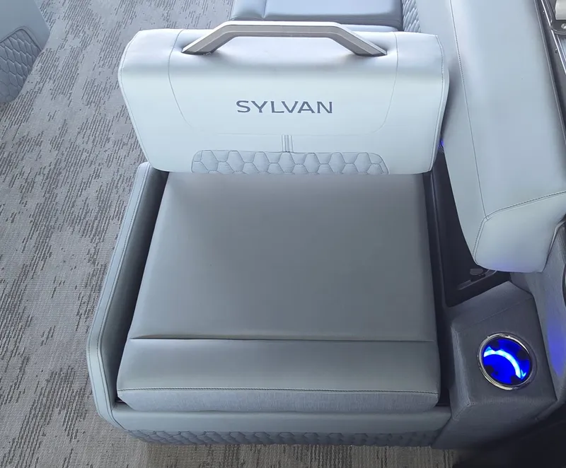 Slide: The Image of A luxurious gray seat with Sylvan logo and illuminated cup holder. - 21