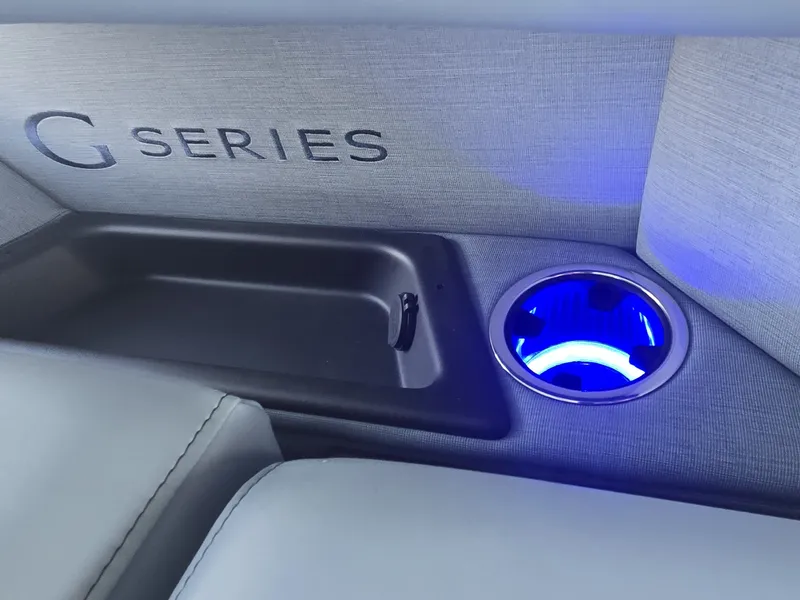Slide: The Image of Close-up of a boat interior with illuminated cup holder and "G Series" lettering. - 35