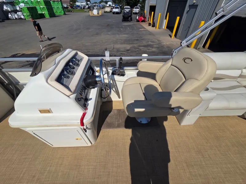 Slide: The Image of The image shows the cockpit of a 1998 Sylvan 826 Nexus with a beige captain's chair. - 19