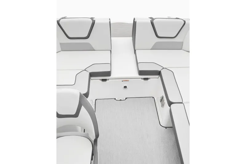 Slide: The Image of The image shows the interior of a Yamaha SX220 boat with modern, cushioned seating in white and gray. - 7