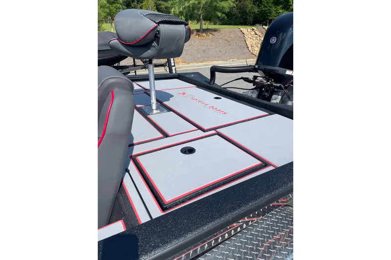 Slide: The Image of 2027 Xpress H20 Bass boat interior with sleek seating and storage compartments. - 3