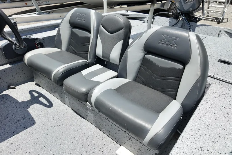 Slide: The Image of 2016 Xpress XP7 boat seats in gray and black, showcasing comfortable design and branding. - 9