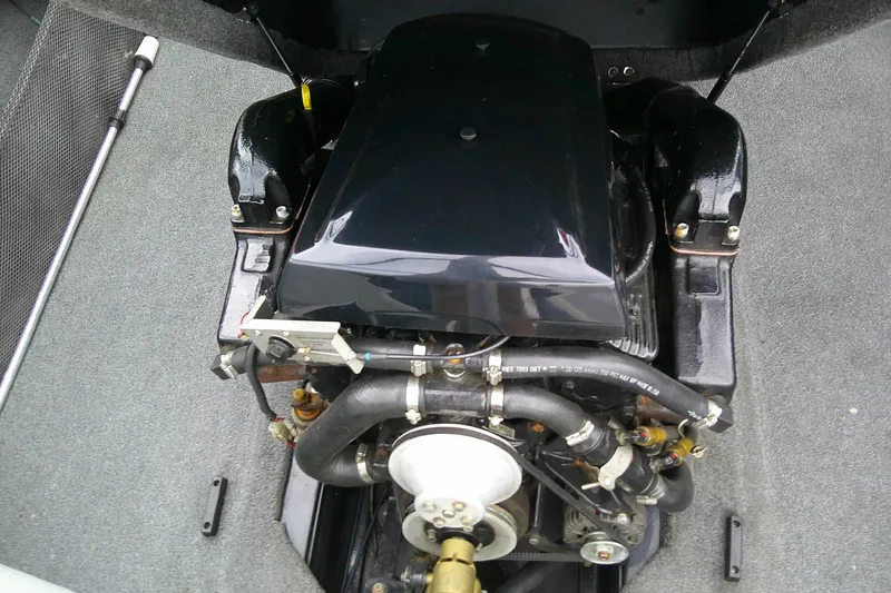 Slide: The Image of 2005 Malibu iRide boat engine, detailed view of components and layout. - 7