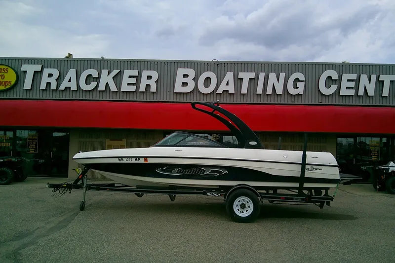 Slide: The Image of 2005 Malibu iRide boat on trailer at Tracker Boating Center. - 0