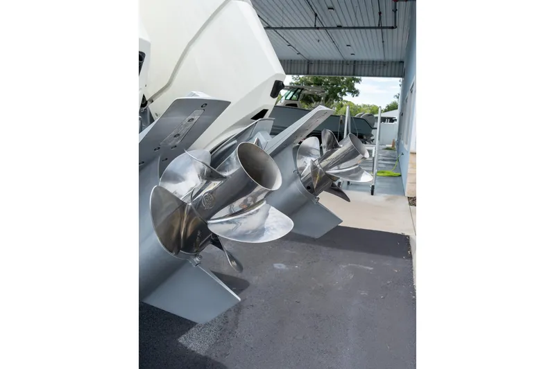 Slide: The Image of 2023 Solace 41CS boat propellers in a garage setting. - 19