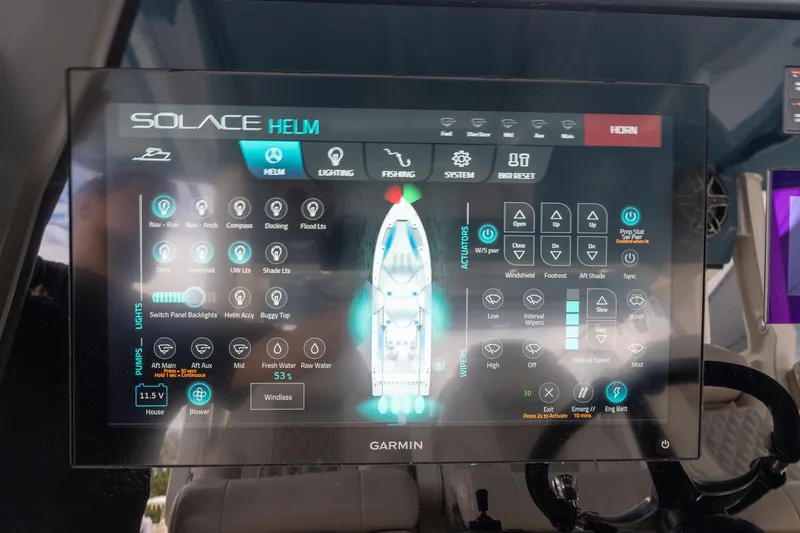 Slide: The Image of Touchscreen control panel of 2023 Solace 41CS boat, displaying helm and system settings. - 47