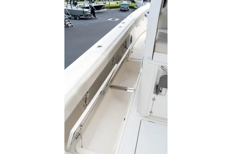 Slide: The Image of 2023 Solace 41CS boat interior storage compartment, open and spacious design. - 44