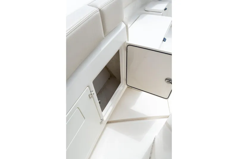 Slide: The Image of 2023 Solace 41CS boat interior storage compartment with open hatch. - 56