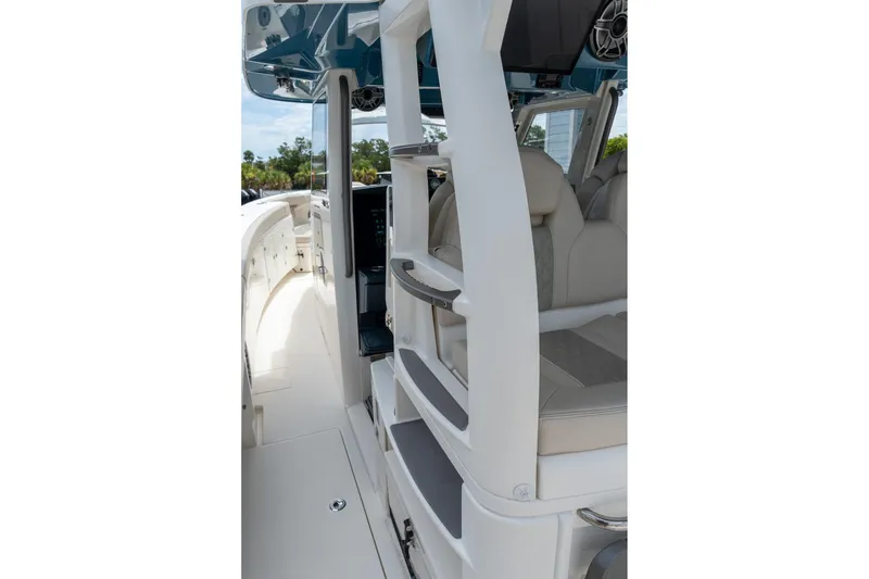 Slide: The Image of 2023 Solace 41CS boat interior with modern seating and sleek design. - 14