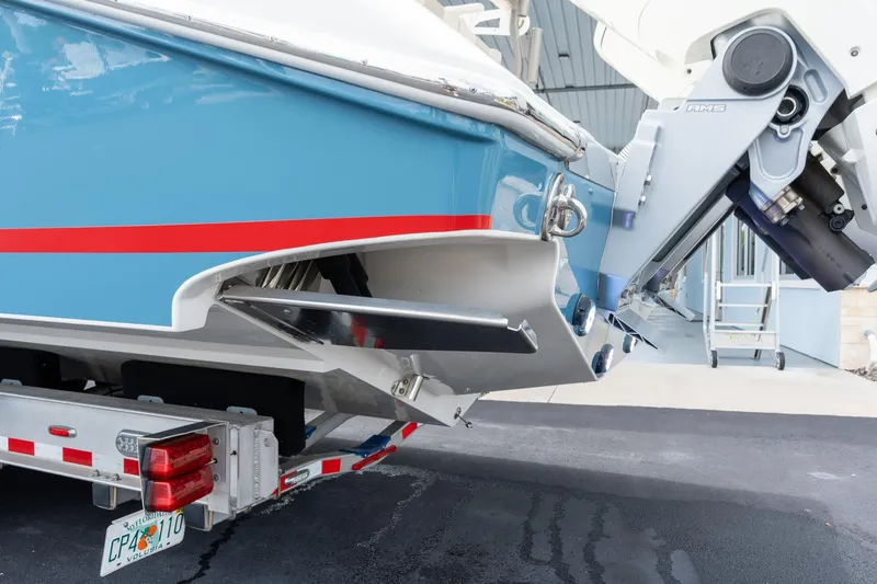 Slide: The Image of 2023 Solace 41CS boat stern with trailer, showcasing sleek design and modern engineering. - 22