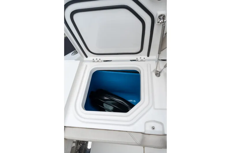 Slide: The Image of Open storage compartment on 2023 Solace 41CS boat, showcasing interior space. - 28