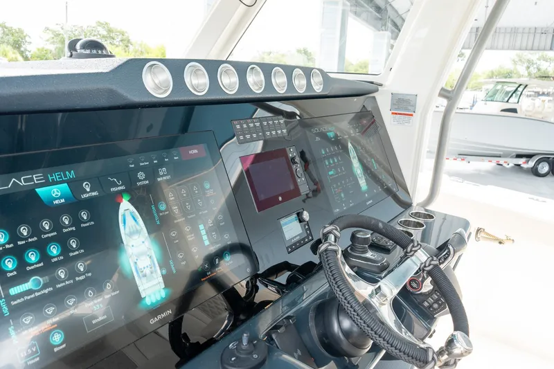 Slide: The Image of 2023 Solace 41CS helm with advanced touchscreen navigation and control systems. - 49