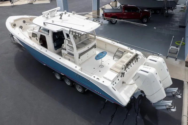 Slide: The Image of 2023 Solace 41CS boat with dual engines, spacious deck, and modern design. - 3
