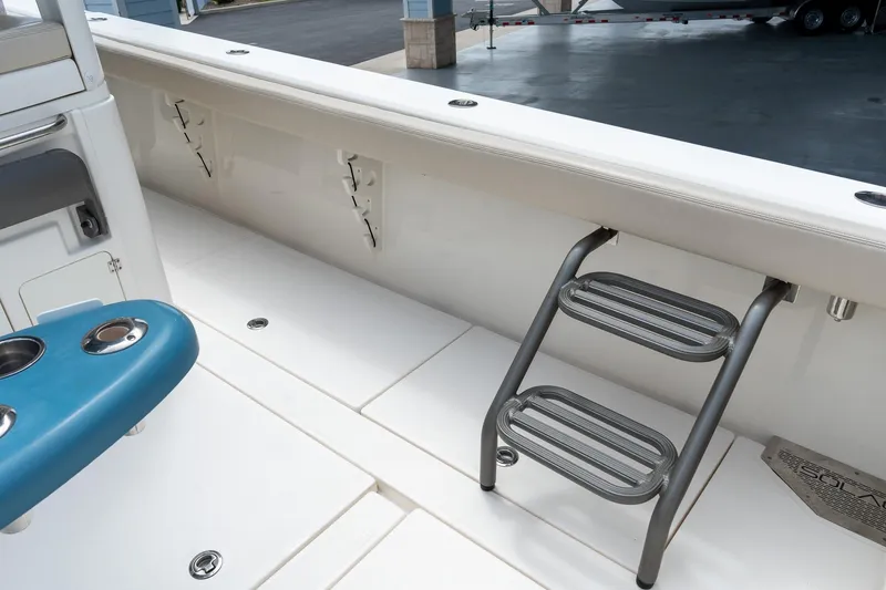 Slide: The Image of 2023 Solace 41CS boat interior with ladder and seating area. - 41