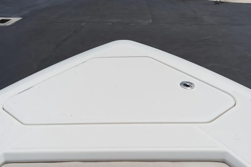 Slide: The Image of Bow deck of 2023 Solace 41CS boat, featuring a sleek, white surface design. - 61