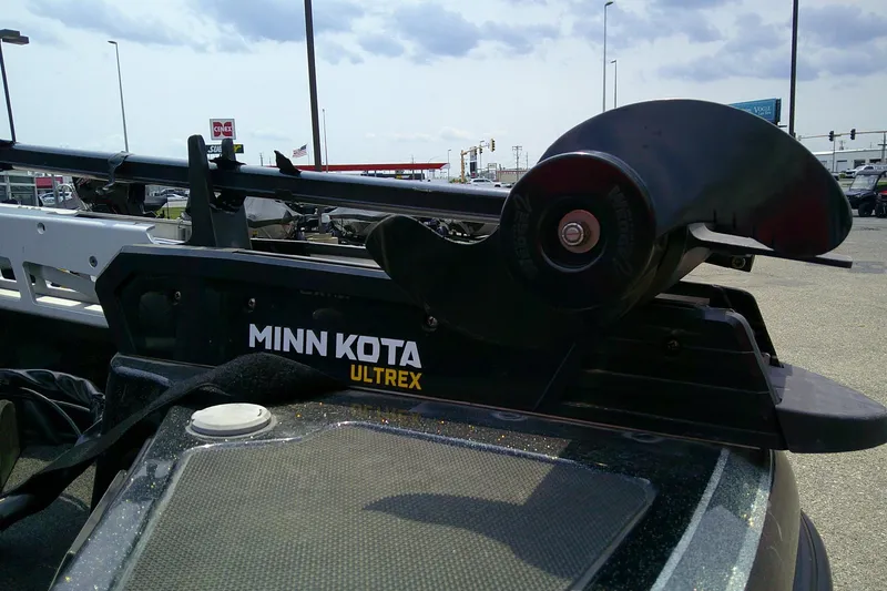 Slide: The Image of Minn Kota Ultrex motor on 2018 Nitro ZV21 boat, parked outdoors. - 6