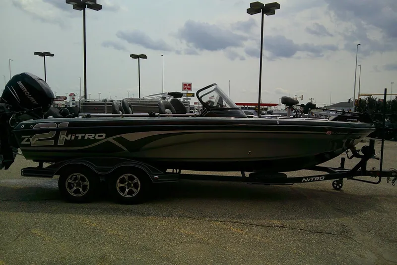 Slide: The Image of 2018 Nitro ZV21 boat on trailer in parking lot, side view. - 4