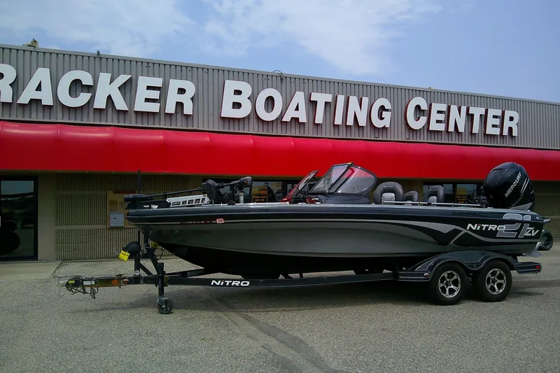 Slide: The Image of 2018 Nitro ZV21 boat on trailer outside Tracker Boating Center. - 1
