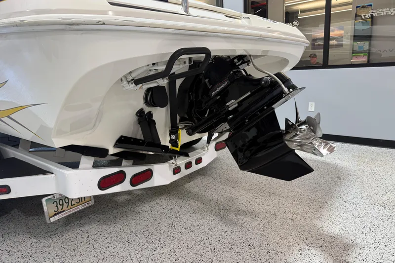 Slide: The Image of 2002 Nordic Boats 28' Heat with MerCruiser engine on trailer in showroom. - 4