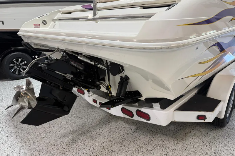 Slide: The Image of Rear view of a 2002 Nordic Boats 28' Heat with MerCruiser engine and trailer. - 6