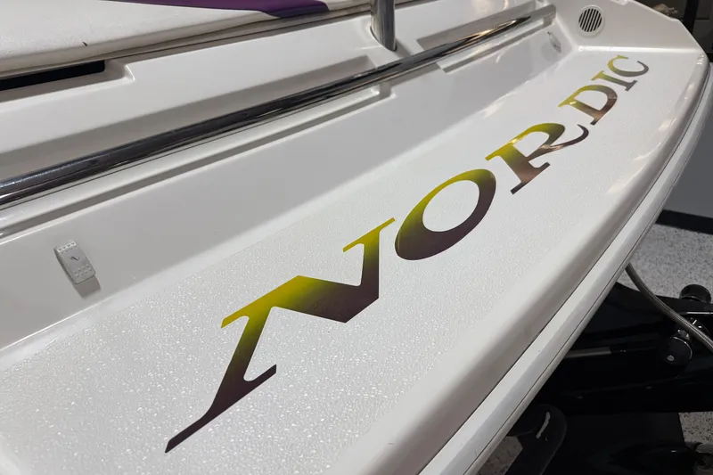 Slide: The Image of 2002 Nordic Boats 28' Heat, showcasing sleek design and bold branding. - 18