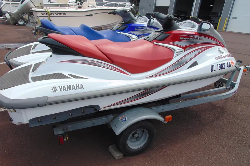 Slide: The Image of 2006 Yamaha WaveRunner FX Cruiser with red seat on a trailer. - 6