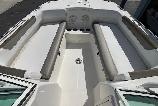 Slide: The Image of 2019 World Cat 230 DC boat interior with spacious seating and modern design. - 4