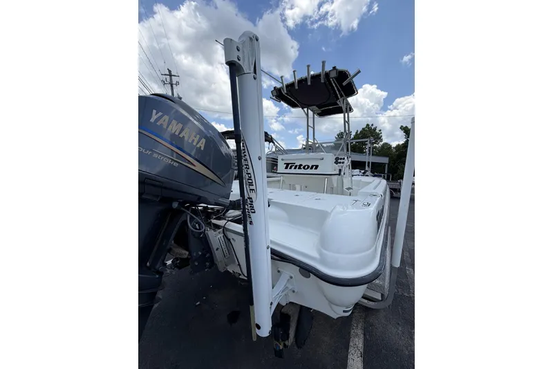 Slide: The Image of 2003 Triton 220 LTS boat with Yamaha outboard motor and Power-Pole anchor system. - 9