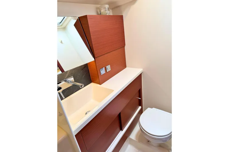 Slide: The Image of Modern bathroom interior of 2020 Hanse 458 yacht with sleek sink and toilet. - 27