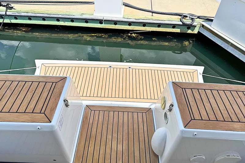 Slide: The Image of Teak deck of 2020 Hanse 458 yacht at marina dock. - 7