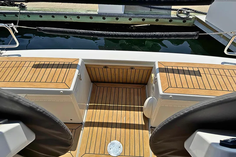 Slide: The Image of Cockpit view of 2020 Hanse 458 yacht with teak flooring and seating. - 8