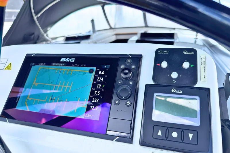 Slide: The Image of Navigation system and controls on a 2020 Hanse 458 yacht dashboard. - 4