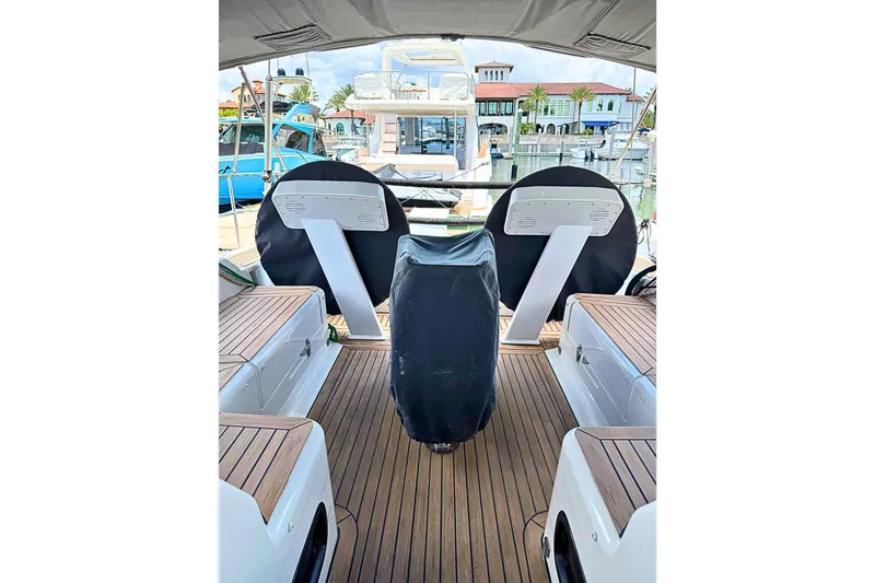 Slide: The Image of Interior view of a 2020 Hanse 458 yacht with wooden deck and covered steering. - 5