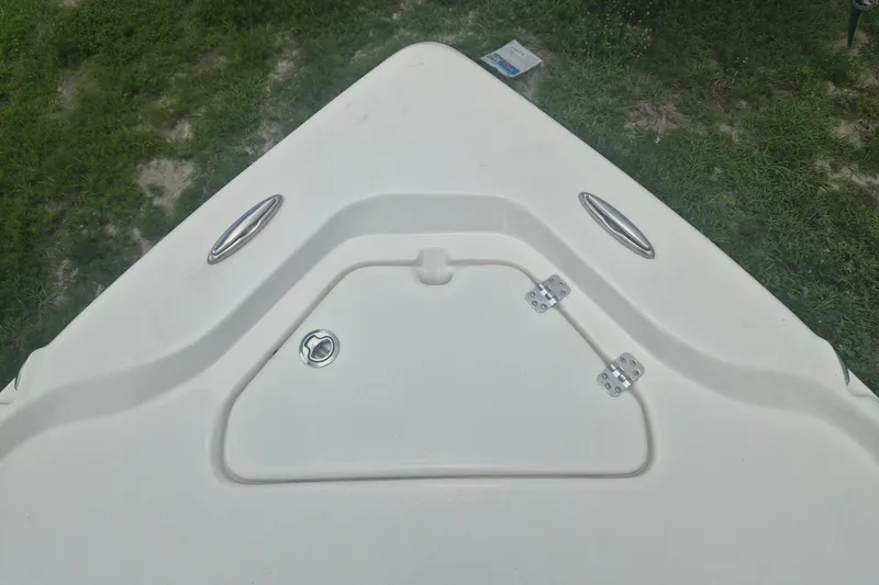 Slide: The Image of Bow of 2026 Key West 210 Bay Reef boat with storage hatch and cleats. - 18