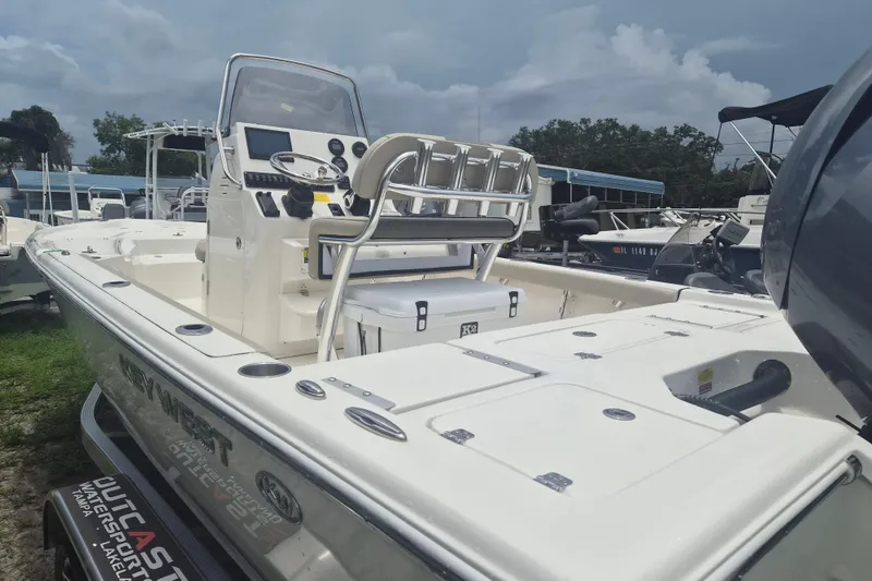 Slide: The Image of 2026 Key West 210 Bay Reef boat with sleek design and modern console features. - 4